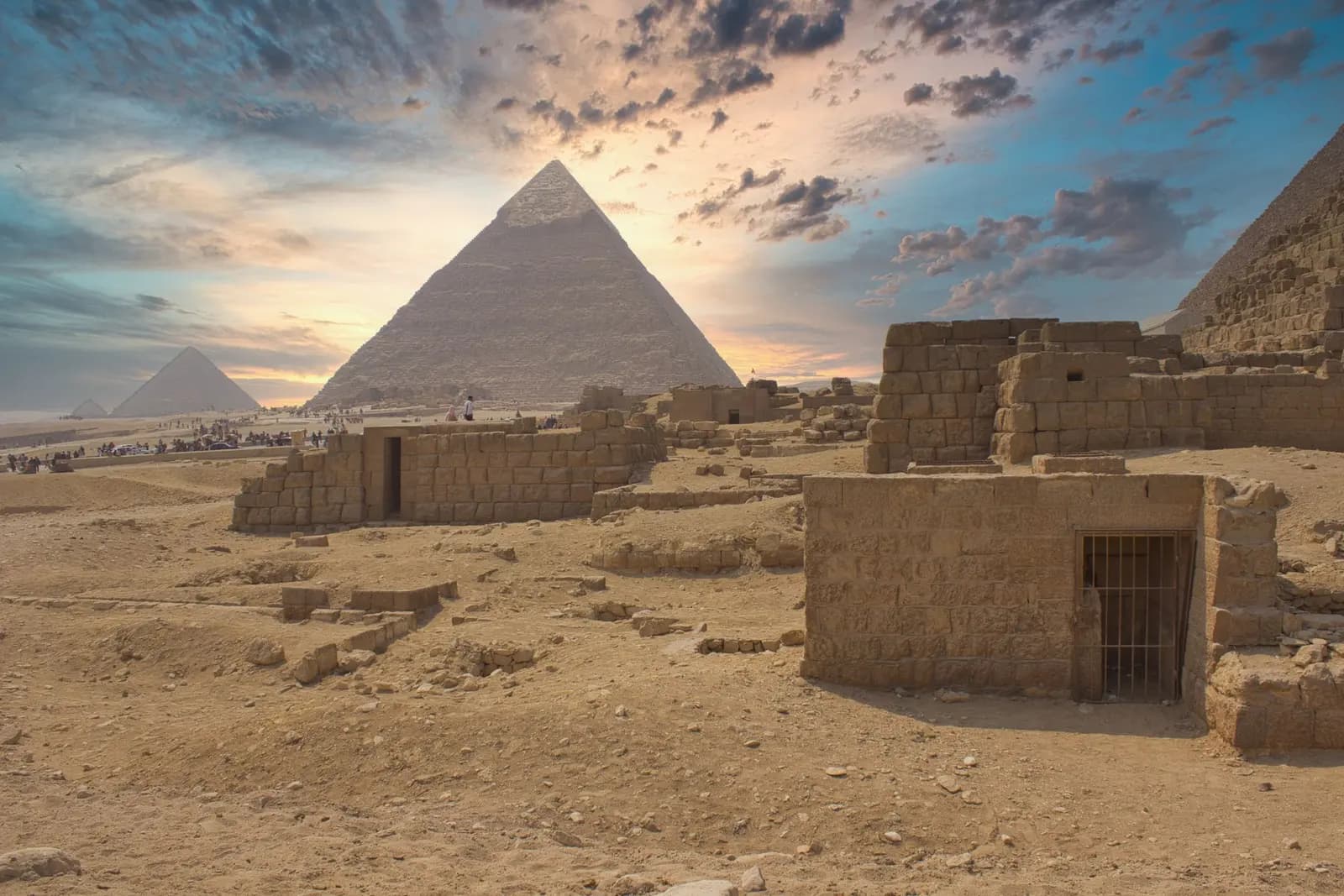 The Pyramid of Khafre and ancient ruins at Giza under a dawn sky